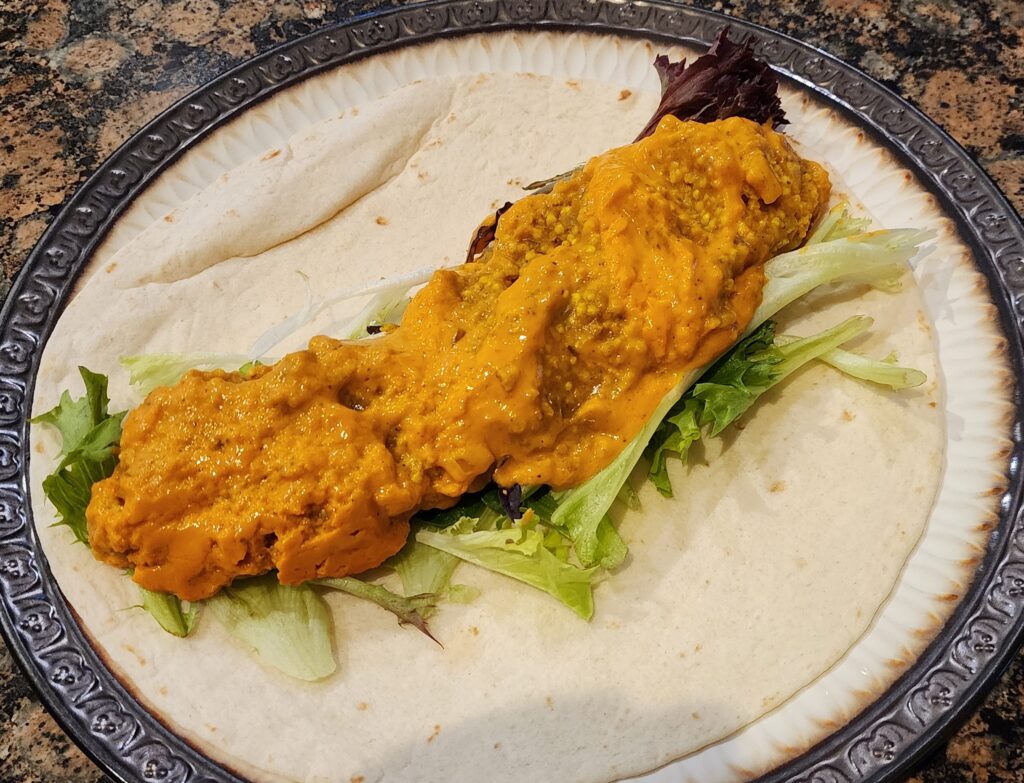 curried millet wraps with red pepper sauce